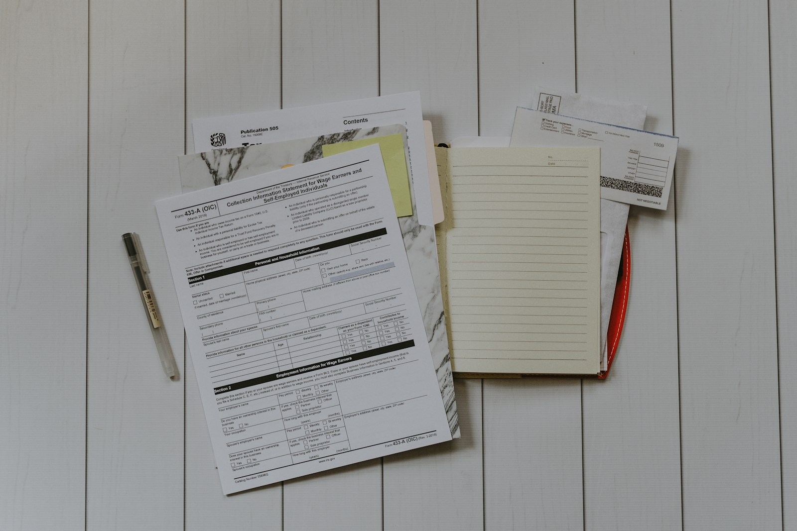 Loan paperwork spread on a table